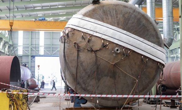 Post weld heat treatment to pressure vessel. It is a controlled process in which a material that has been welded is reheated to a temperature below its lower critical transformation temperature.
